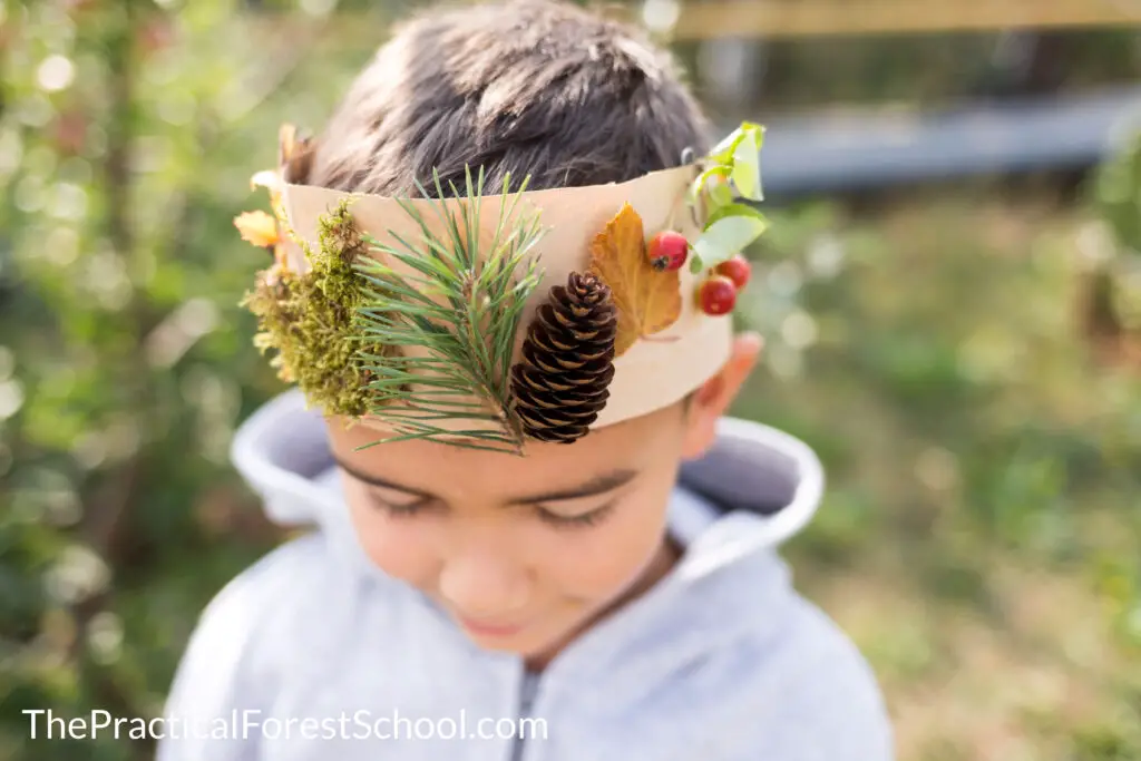 boy wearing leaf crown