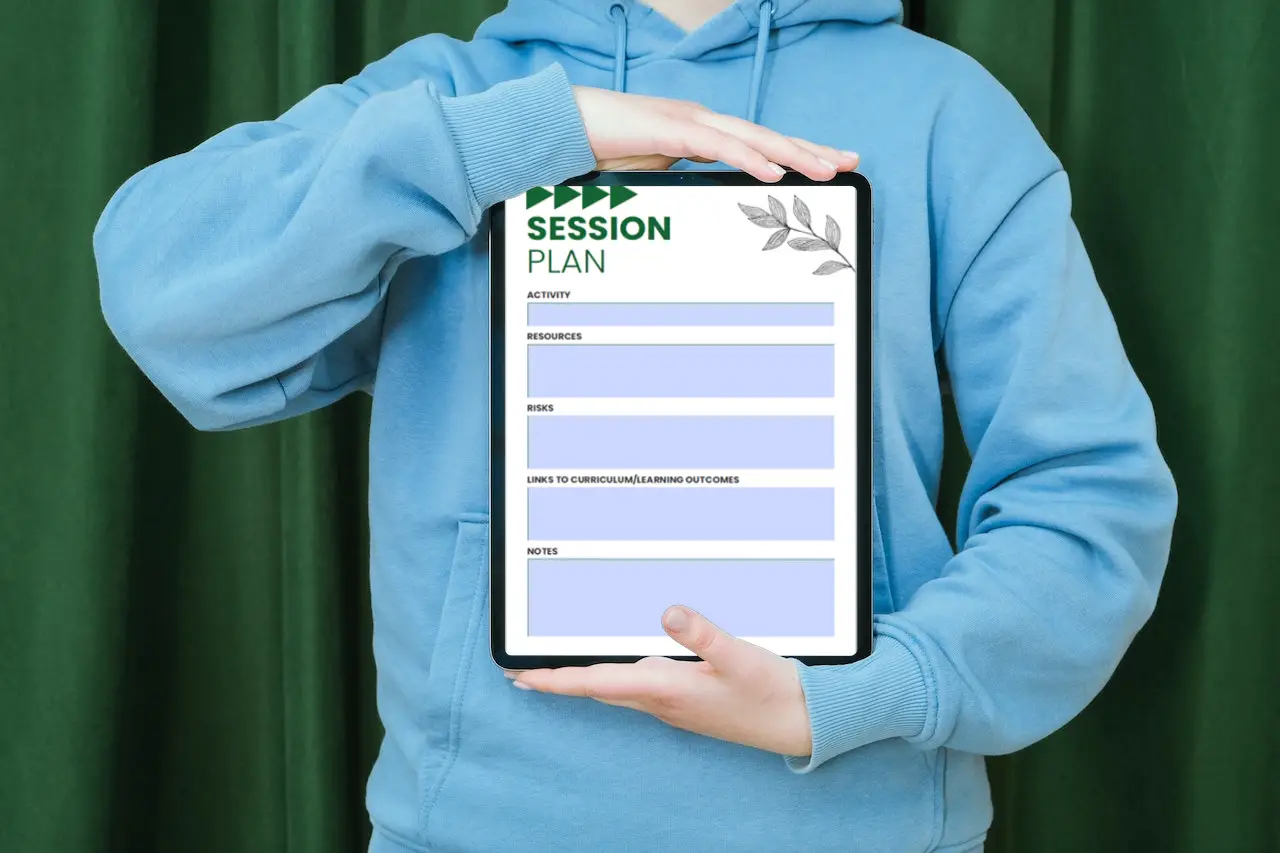 Person showing planner on an iPad